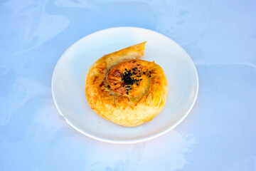 Turkish pastry product , tasty pogaca, acma . Simit, gevrek. Turkish Pastries; peynirli, patatesli, kasarli pogaca, sosili acma, dereotlu pogaca,  borek, acma, ay coregi at patisserie showcase.