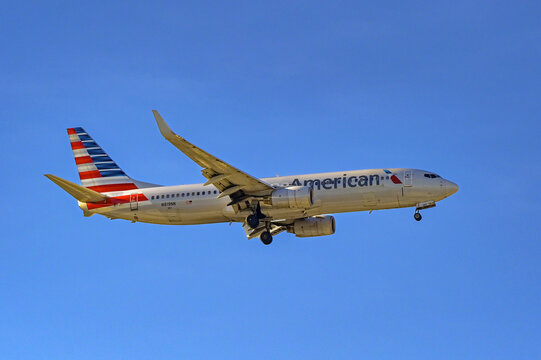 Miami, Florida, USA - 4 January 2025: Boeing 737 800 jet (registration N837NN) operated by American Airlines about to land at Miami International airport