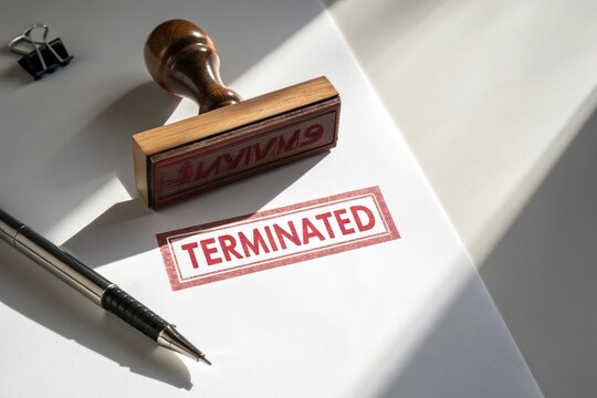 Terminated Stamp on Document Termination Contract End Cancelled Agreement Contractual Cancellation Business Concept