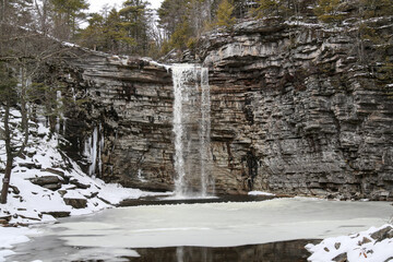 awosting falls in minnewaska state park (famous waterfall in upstate new york) covered in snow during winter woe (beautiful peaceful snowy hiking hike walking trail) travel destination