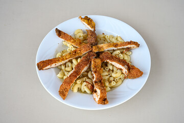 Macaroni Salad with red bell pepper, onion, celery, gherkins and mayonnaise dressing.Traditional Italian pasta with vegetables and creamy cottage cheese in a bowl. Fettuccini, alfredo makarna.
