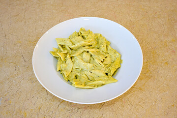 Macaroni Salad with red bell pepper, onion, celery, gherkins and mayonnaise dressing.Traditional Italian pasta with vegetables and creamy cottage cheese in a bowl. Fettuccini, alfredo makarna.