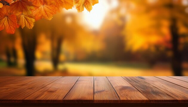 wooden table top with blur background of autumn