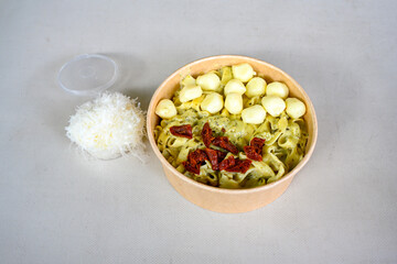 Macaroni Salad with red bell pepper, onion, celery, gherkins and mayonnaise dressing.Traditional Italian pasta with vegetables and creamy cottage cheese in a bowl. Fettuccini, alfredo makarna.