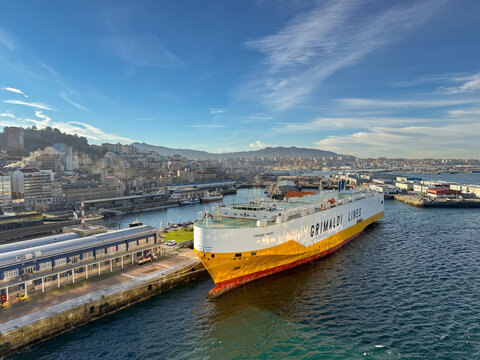 Vigo, Spain - 14 January 2025: Vehicle carrier ship Grande Napoli docked in the port of Vigo. The car transporter is operated by Grimaldi Lines.