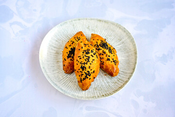 Turkish pastry product , tasty pogaca, acma . Simit, gevrek. Turkish Pastries; peynirli, patatesli, kasarli pogaca, sosili acma, dereotlu pogaca,  borek, acma, ay coregi at patisserie showcase.