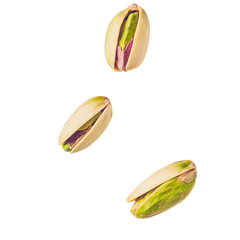 Falling pistachios on a white background 