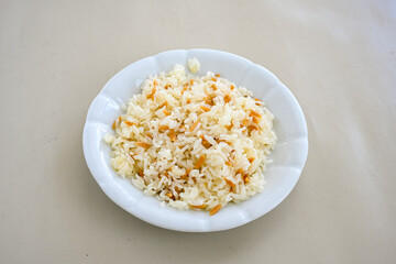 Traditional delicious Turkish food; Turkish style rice pilaf (Turkish name; Arpa sehriyeli. tavuk, kuru fasulyeli, pirinc pilavi). Cigerli, kavurmali, tereyagli nohut pilav.
