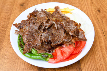 Lavash zurna doner kebab ( zurna  durum )  or shawarma sliced in plate isolated.  hatay usulu tavuk...