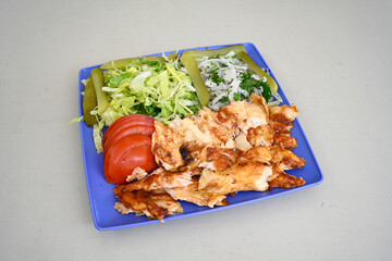 Lavash zurna doner kebab ( zurna  durum )  or shawarma sliced in plate isolated.  hatay usulu tavuk...