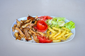 Lavash zurna doner kebab ( zurna  durum )  or shawarma sliced in plate isolated.  hatay usulu tavuk Et doner durum. Gobit ekmek arasi doner. Pilavustu iskender doner kebap. 