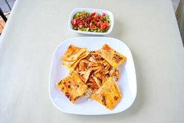 Lavash zurna doner kebab ( zurna  durum )  or shawarma sliced in plate isolated.  hatay usulu tavuk Et doner durum. Gobit ekmek arasi doner. Pilavustu iskender doner kebap. 