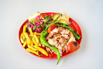 Lavash zurna doner kebab ( zurna  durum )  or shawarma sliced in plate isolated.  hatay usulu tavuk...