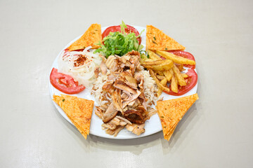 Lavash zurna doner kebab ( zurna  durum )  or shawarma sliced in plate isolated.  hatay usulu tavuk Et doner durum. Gobit ekmek arasi doner. Pilavustu iskender doner kebap. 