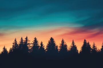 A peaceful forest skyline silhouetted against a sky bursting with layers of rich sunset colors, from glowing peach to velvety indigo