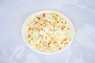 Traditional delicious Turkish food; Turkish style rice pilaf (Turkish name; Arpa sehriyeli. tavuk, kuru fasulyeli, pirinc pilavi). Cigerli, kavurmali, tereyagli nohut pilav.
