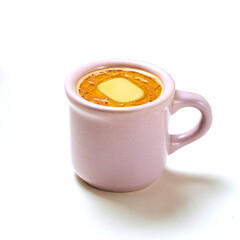 A cozy hot chocolate drink presented in a soft pastel pink cup, ideal for warm moments or leisurely afternoons, highlighting rich textures and warmth