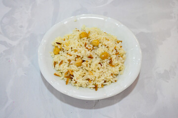 Traditional delicious Turkish food; Turkish style rice pilaf (Turkish name; Arpa sehriyeli. tavuk, kuru fasulyeli, pirinc pilavi). Cigerli, kavurmali, tereyagli nohut pilav.

