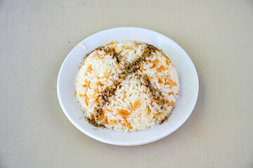 Traditional delicious Turkish food; Turkish style rice pilaf (Turkish name; Arpa sehriyeli. tavuk, kuru fasulyeli, pirinc pilavi). Cigerli, kavurmali, tereyagli nohut pilav.
