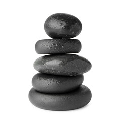 Stack of wet spa stones isolated on white