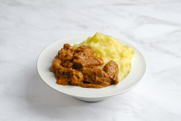 Beef goulash with mashed potato