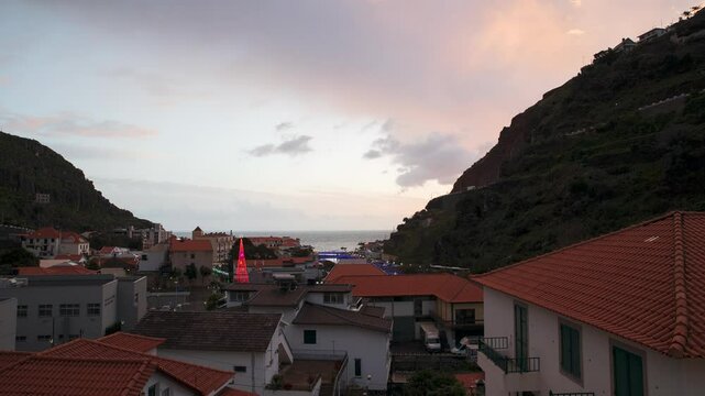 beautiful sunset in the Christmas Day over the city of Ribeira Brava in Portugal island of Madeira
