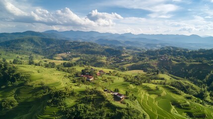 Obraz premium Serene landscape view, lush green hills and valleys under a blue sky, showcasing natural beauty and tranquility.