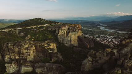 Aerial view of Meteora Monasteries in Greece. Magnificent monasteries of Meteora on the rocks at sunset