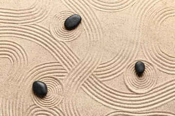 Fotobehang Zen Stenen Black zen stones on sand with pattern  © Pixel-Shot