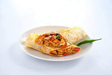 Meat, chicken shawarma kebab with yogurt and fried butter sauce .Tantuni Special. durum  Yogurtlu tantuni. Ekmek arasi tantuni. 