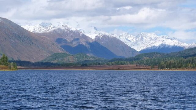 Picturesque landscape with Lake Yazevoe or Karakol in Katon - Karagay Park Altai sunny autumn in Kazakhstan