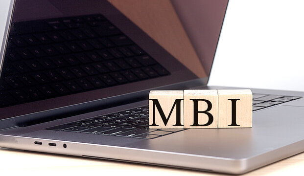 MBI text on wooden blocks placed on a laptop keyboard