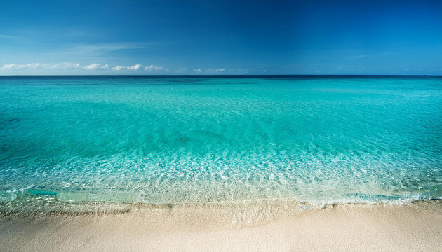 panaromic picture of beach with blue and green toned crystal clear sea and sand as a luxurious summer season excursion historical past or backdrop