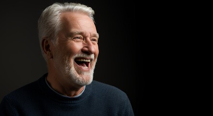 Obraz premium Senior Man Laughing Joyfully Against Dark Background Expressing Happiness