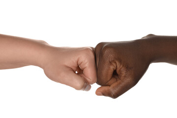 Stop racism. People of different skin colors bumping fists on white background, closeup