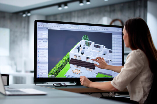 Female architect using 3D software