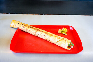Lavash zurna doner kebab ( zurna  durum )  or shawarma sliced in plate isolated.  hatay usulu tavuk Et doner durum. Gobit ekmek arasi doner. Pilavustu iskender doner kebap. 