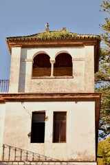 Old abandoned building with moss on the roof