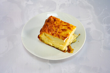 Turkish style meat stuffed filo dough borek served kol boregi. Cheese and minced pie are sliced on a marble background.  Avci boregi.Turkish name: Kol Boregi. Kiymali, peynirli su boregi.