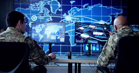 Cyber Technology Expert Monitors Security Cameras In Government Control Center