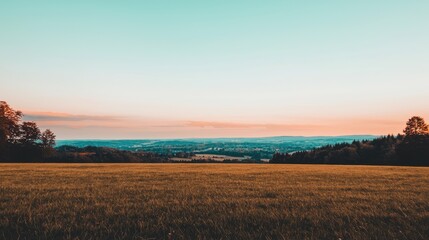 Sunset landscape photography rolling hills open field serene environment wide-angle view nature's beauty