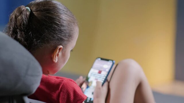 Kids using smart phone scrolling screen