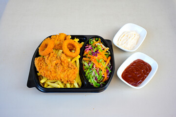 Homemade fried chicken nuggets isolated on white background. Chicken nugget. Citir tavuk. Citir, tavuk atistirma  tabagi.