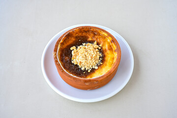 Baked rice pudding turkish milky dessert sutlac, keskul  (Turkish name; firin sutlac). Findikli Hamsikoy Sutlac