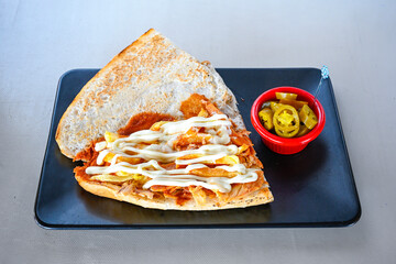 Lavash zurna doner kebab ( zurna  durum )  or shawarma sliced in plate isolated.  hatay usulu tavuk...