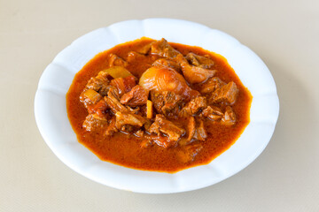 Dana kavurma, guvec.Sauteed meat with carrots and peas ( Turkish ; Et, Tavuk Sote. guvec  ) Et kavurma, ciftlik kebap.