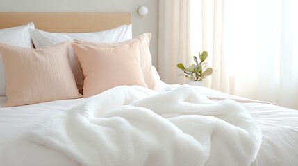 Cozy white bed with pastel pillows, a soft blanket, and a potted plant by the window, creating a serene bedroom vibe.