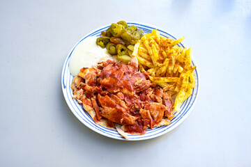 Lavash zurna doner kebab ( zurna  durum )  or shawarma sliced in plate isolated.  hatay usulu tavuk...