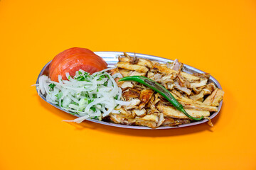 Lavash zurna doner kebab ( zurna  durum )  or shawarma sliced in plate isolated.  hatay usulu tavuk...