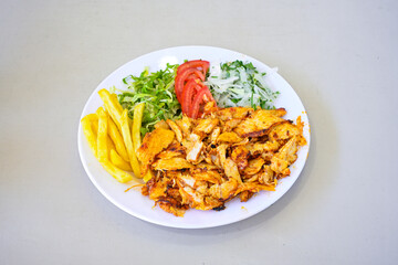 Lavash zurna doner kebab ( zurna  durum )  or shawarma sliced in plate isolated.  hatay usulu tavuk Et doner durum. Gobit ekmek arasi doner. Pilavustu iskender doner kebap. 